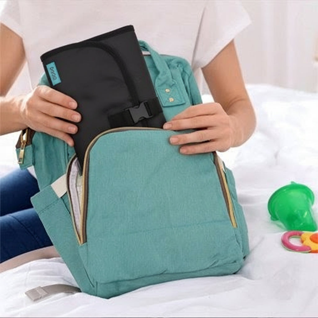 Tapis à langer nomade compact